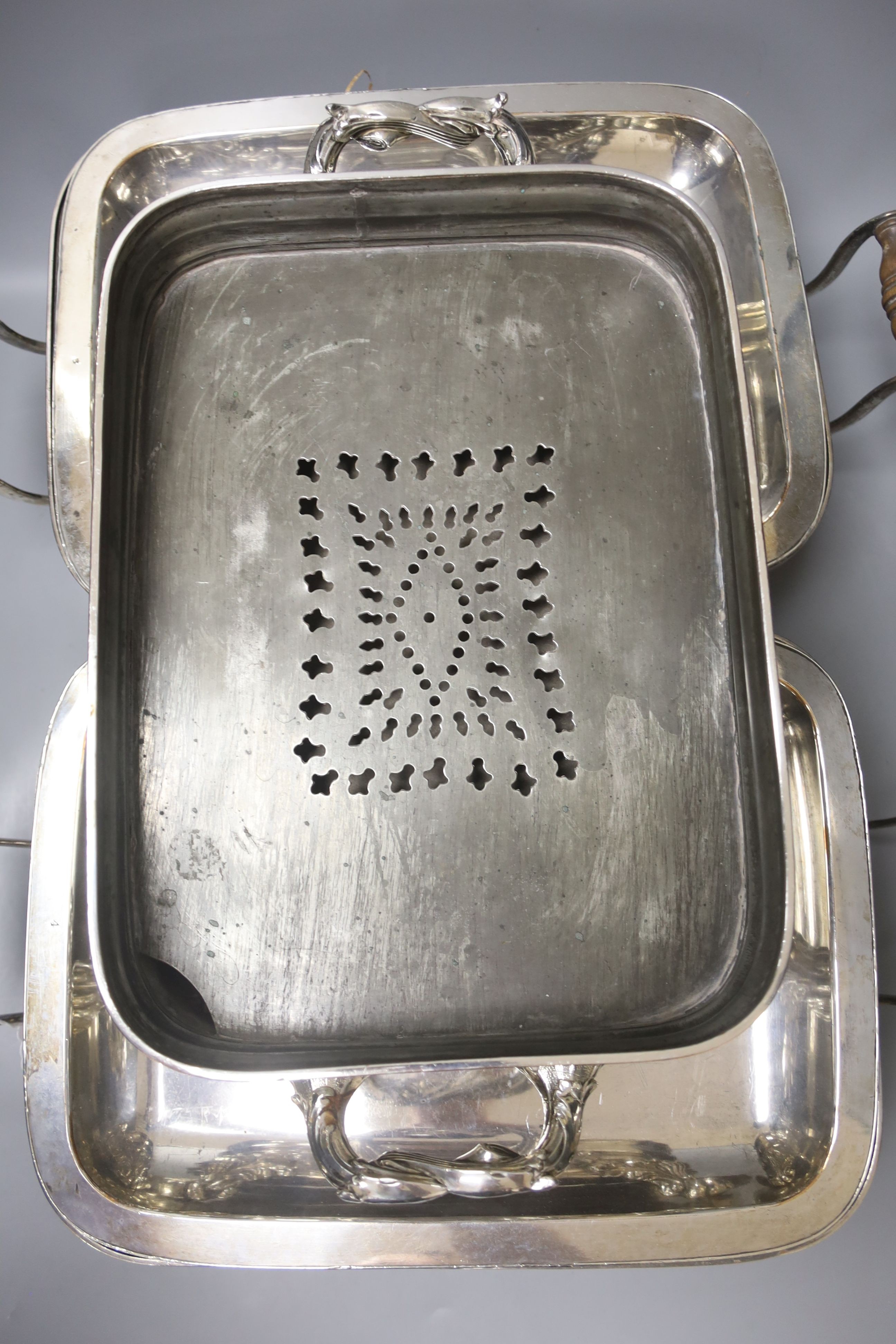 A pair of old Sheffield plated chafing dishes, width overall 40cm, and another similar dish